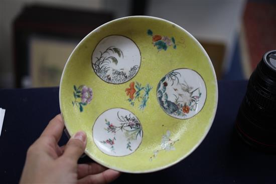 A pair of Chinese yellow ground famille rose medallion dishes, 19th century, 19cm, ground off glaze to base